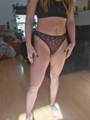 Carey’s Sheer Black Strawberry Thong